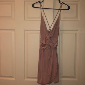 Never worn blush cross back dress.